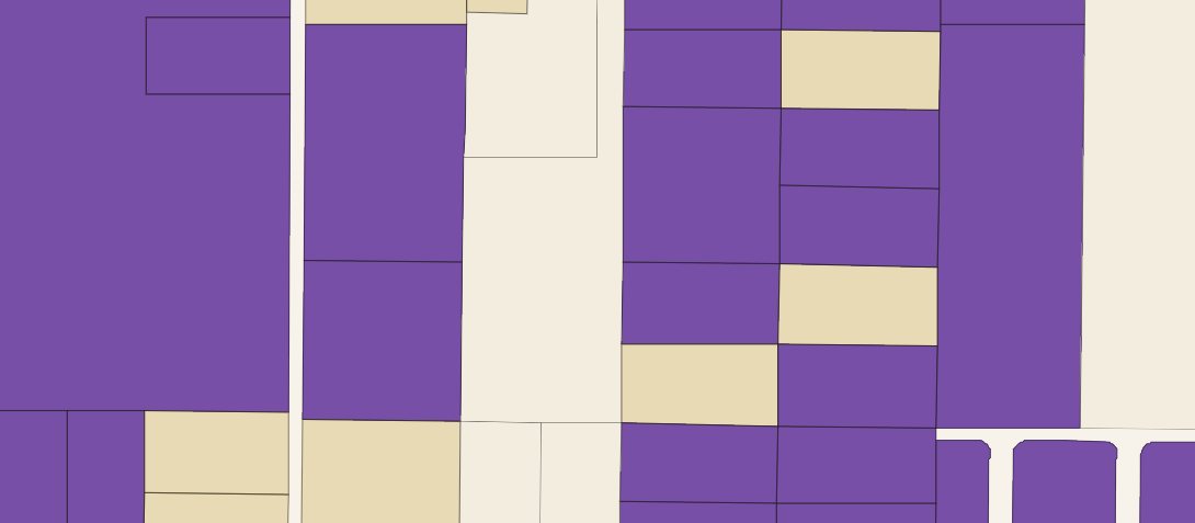 A dense zoomed-in frame of the live Indian River map: fine parcel fabric with underbuilt parcels in orange and recorded sales as blue markers